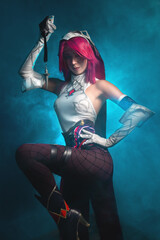 Young beautiful caucasian girl in sexy cosplay with pink hair and voluminous breasts - obrazy, fototapety, plakaty