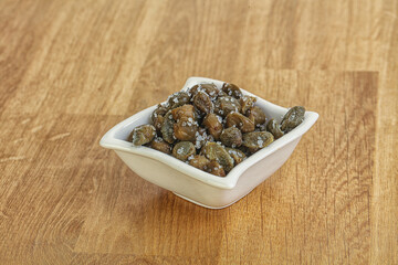 Salted marinated capers snack appetiser