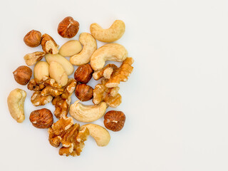 flat lay view mixed nuts isolated on a white background