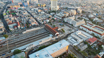 Fototapeta premium Aerial view of Jakarta Kota Train Station with Jakarta cityscape background. 
