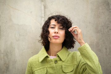 Portrait of stylish young woman in warm jacket