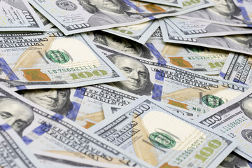 Background of one hundred dollar bills