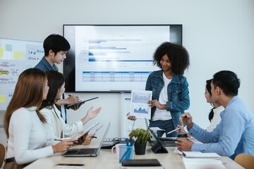 Group of professional business people are working and brainstorming discussed about work in conference room within office space.