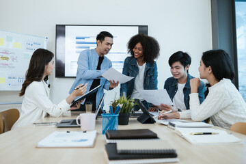 Group of professional business people are working and brainstorming discussed about work in conference room within office space.