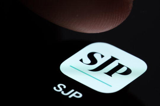 SJP app seen on smartphone screen and finger about to touch it. St. James's Place (SJP) is an Expert Financial Advice company. Stafford, United Kingdom, August 29, 2022.