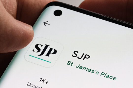 SJP app seen on smartphone screen and finger about to touch it. St. James's Place (SJP) is an Expert Financial Advice company. Stafford, United Kingdom, August 29, 2022.