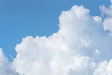 Naklejka na ściany i meble Close up of big clouds on day light, Clear blue sky and fluffy soft white cloud with copy space, Nature abstract background image