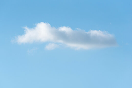 Close up of single clouds on day light, Clear blue sky and fluffy soft white cloud with copy space, Nature abstract background image