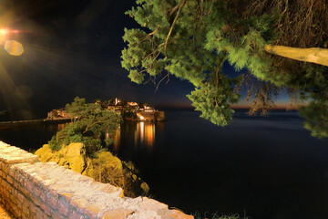 night coast in Budva city, Sveti Stefan beach, Montenegro, Europe...exclusive - this image is sold only on Adobe stock	