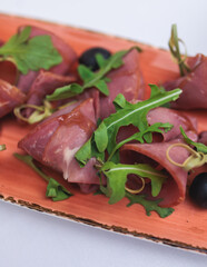 Catering table, beautifully decorated banquet with variety selection of different food snacks and appetizers on a corporate birthday party event or wedding celebration, delicatessen setting