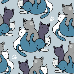 Seamless pattern with blue and white cats.