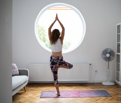 Woman Doing Yoga At Home Healthy Lifestyle