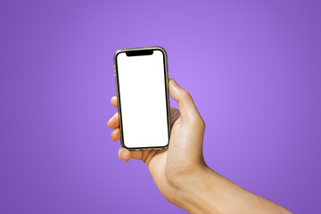 Mobile phone with empty white screen in hand on bright purple background