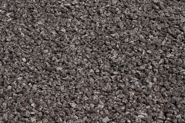 Open stone asphalt on a slope of a Dutch seawall