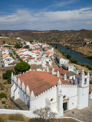 Fototapeta na wymiar General view of Mertola from the Castle, with Mother Church and Guadiana River