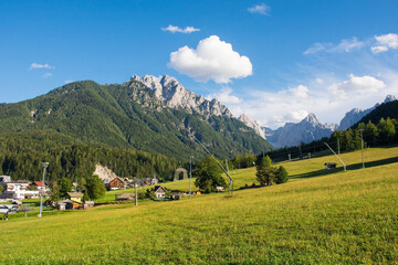 The Alpine landscape near Kranjska Gora, Upper Carniola, Slovenia. Peaks from left to right - Kurji...