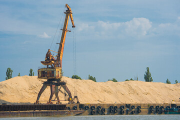 Fototapeta na wymiar Sand mining along the banks of the river