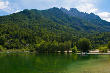 Fototapeta premium Jasna Lake near Kranjska Gora in the Upper Carniola region of north west Slovenia. An artificial lake created for tourism purposes 