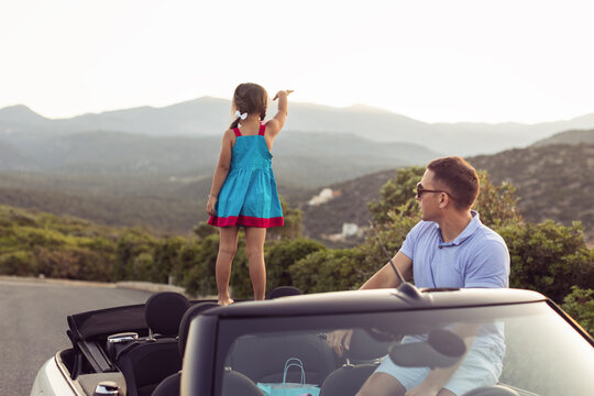 Father and daughter at summer vacation.