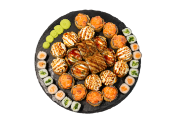 isolated set of different types of sushi on a black marble board for your menu. Sashimi. Nigiri. Chirashi. Maki. Uramaki. Temaki.