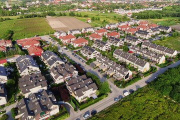 Aerial view of suburban neighborhood, Residential district with houses and streets in small european town