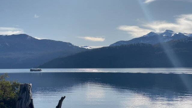 A Tour Boat on the Lacar Lake near Quila Quina Village, Patagonia, Neuquen Province, Argentina. 4K Resolution.