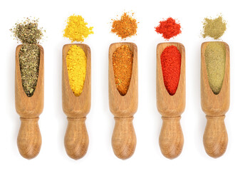 mix of spices in wooden scoop isolated on a white background. Top view. Flat lay. Set or collection