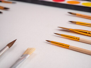 Empty canvas, tools and brushes. Place for text.