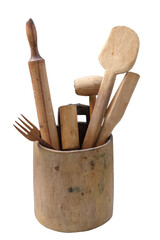 Used wooden kitchen utensils in the wooden pot on white background, isolated