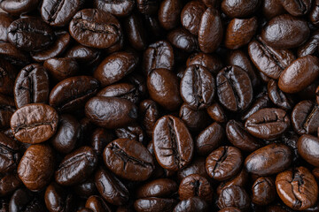 Background of roasted coffee beans. Photo Macro close up.
