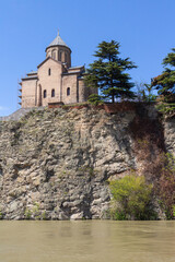 A view of the ancient Metekhi Church, built on the banks of the Mtkvari River in Tbilisi. Georgia...