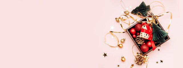 Christmas New Year 2023 banner holiday decor glittering balls and Christmas trees on pink background