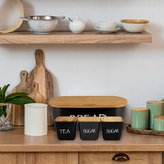 bread box with wooden lid on the kitchen table
