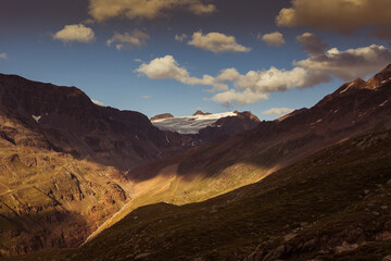 Sunset panorama of alpine highlands countryside with Gepatschferner on the border between Italy and Austria near the Palla Bianca Massif. Popular travel destinations. Vallelunga, Alto Adige, Italy
