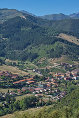 Fototapeta premium Panoramic views of the town of Potes from Mount Arabades on a sunny day, Picos de Europa Natural Park, Cantabria, Spain