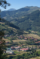 Panoramic views of the town of Potes from Mount Arabades on a sunny day, Picos de Europa Natural Park, Cantabria, Spain