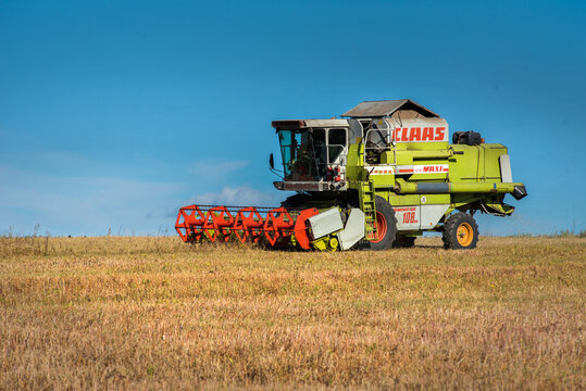 TERNOPIL REGION, UKRAINE - October 23, 2021 - vintage combine CLAAS Dominator 108 SL MAXI harvester in the soybeans field