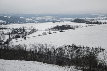 The hills and valleys of western Serbia covered with snow