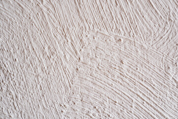 wall with white decorative plaster. background and texture of plaster.