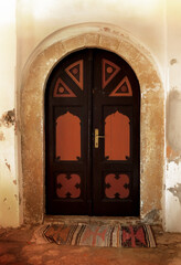 An old mosque brown door