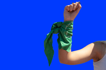 Raised fist with a green scarf alluding to Abortion and the fight of women for their rights. Blue...