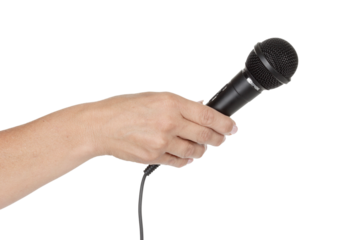 A woman's hand holding a microphone.