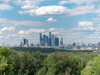 Fototapeta premium Modern buildings of glass and steel skyscrapers against the sky