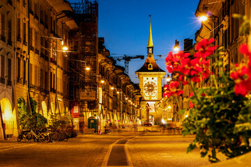 Night scene along Kramgasse in the old town of Bern (Berne, Berna), Switzerland. Zytglogge  Clock...