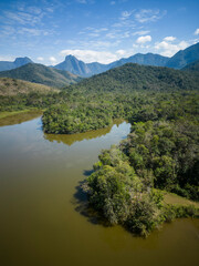 Fototapeta na wymiar Beautiful aerial view to green rainforest lake with muddy water