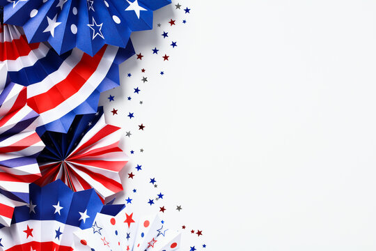 Happy Labor Day, Independence Day, Veterans day banner design. Flat lay red, white, and blue USA paper fans isolated on white background.