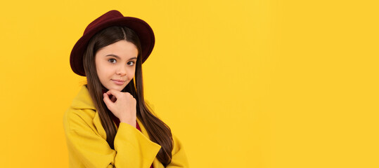 cheerful kid in stylish hat. teen beauty. female fashion model. girl wearing trendy fall clothes. Child face, horizontal poster, teenager girl isolated portrait, banner with copy space.