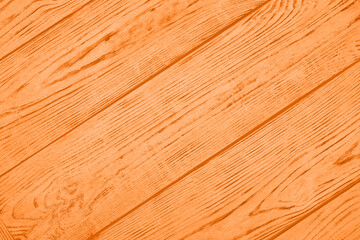 Texture of orange wooden surface as background, top view
