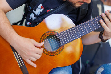 man playing guitar