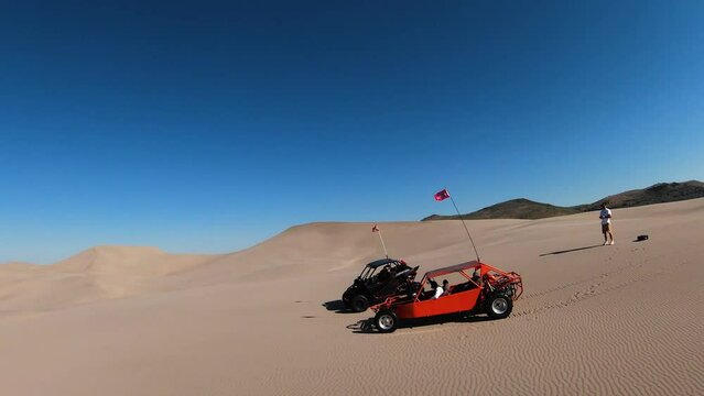 UTV and Dune Buggy Driving in the Desert Sand Dunes